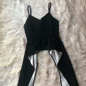 Asymmetrical black peplum top